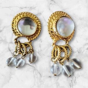 Costume jewelry, very shiny earrings. Very pretty.